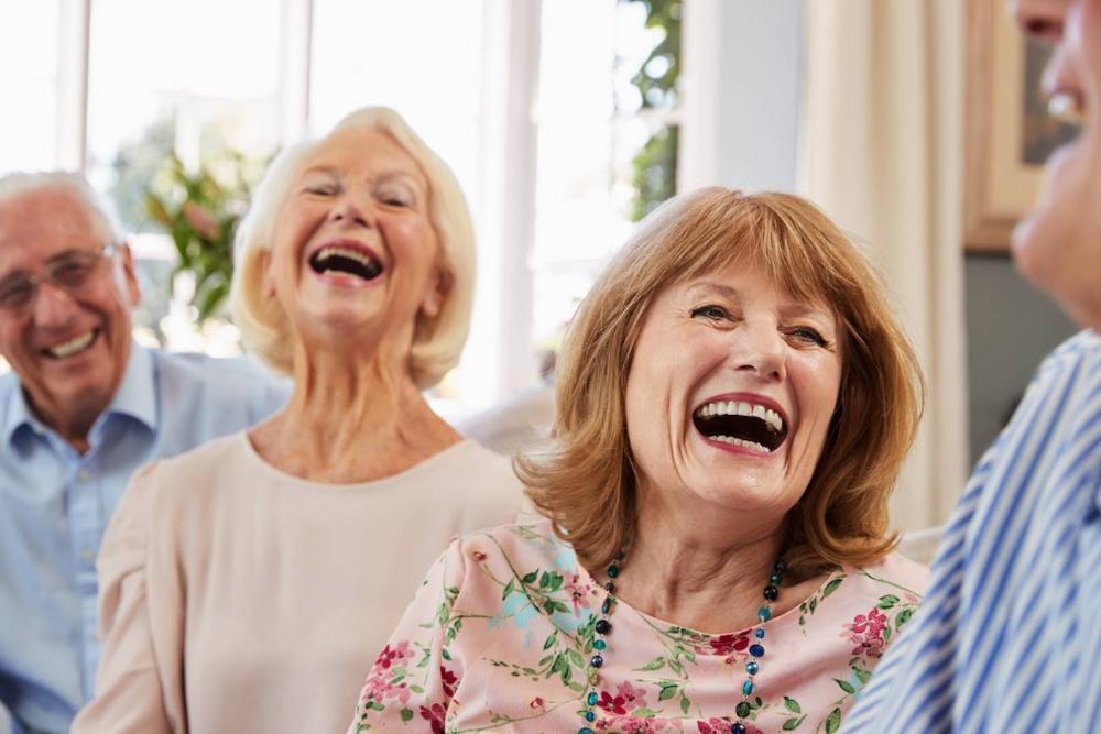 woman laughing | Dentures in Copley OH