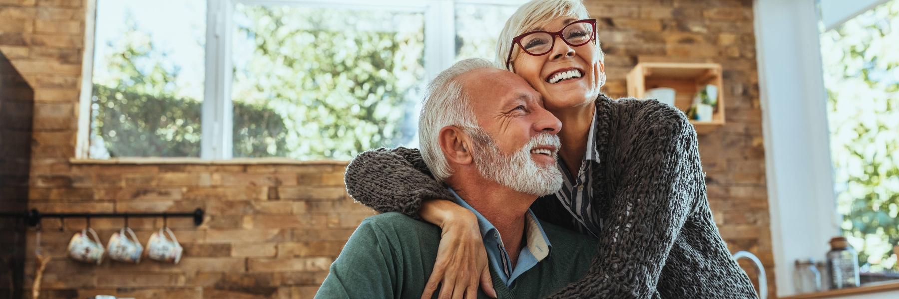 Couple with dental implants in medina